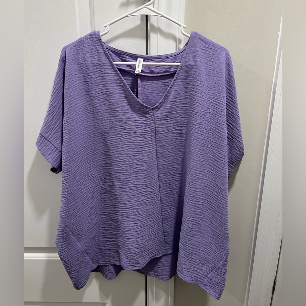Oversized gently used blouse.